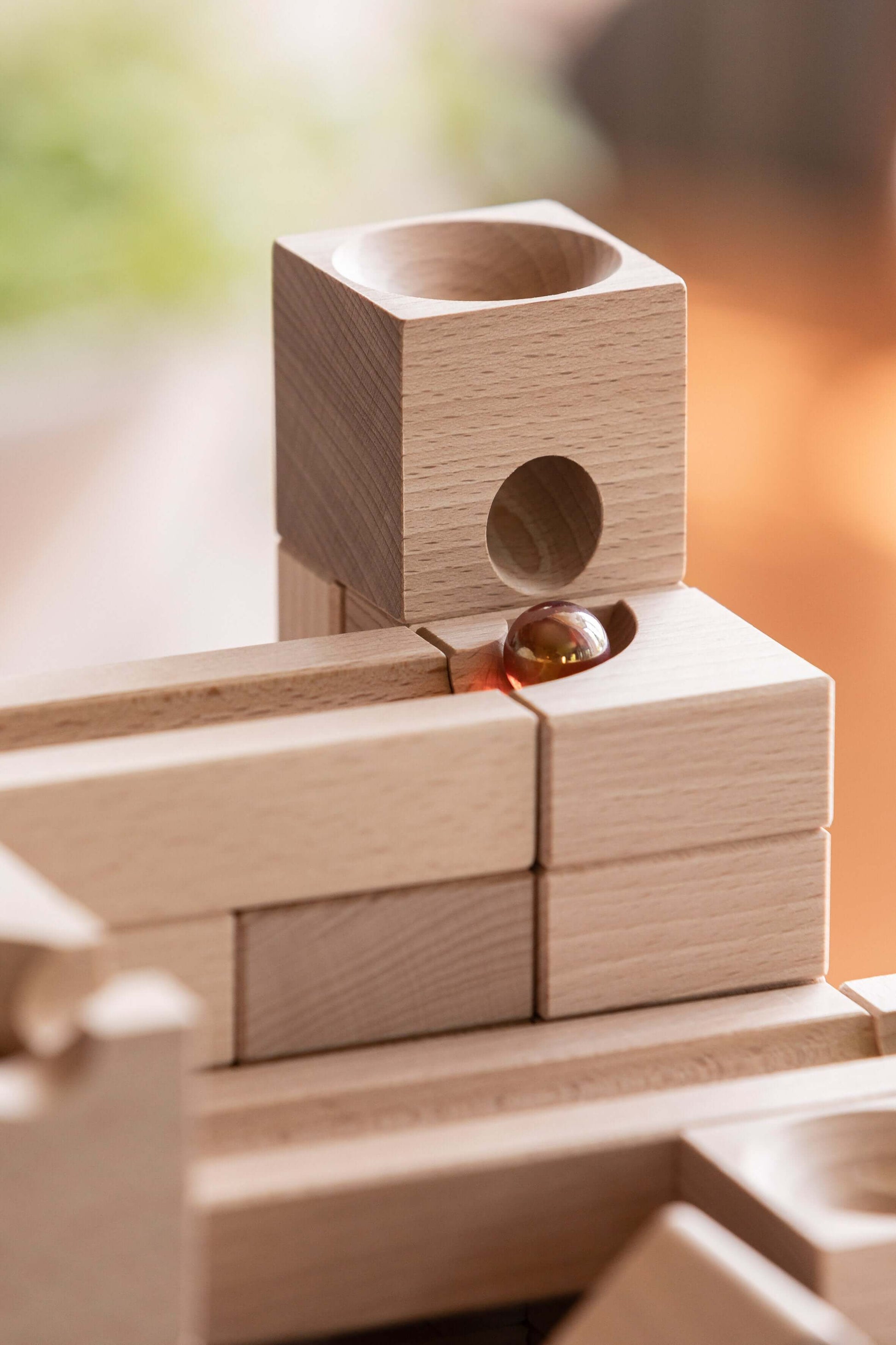 SPEED - Inject exhilarating velocity into your CUBORO marble runs with the SPEED Extra Set! This dynamic wooden educational toy includes 16 elements and 5 marbles, specifically designed to accelerate marbles, allowing them to cover longer distances with i