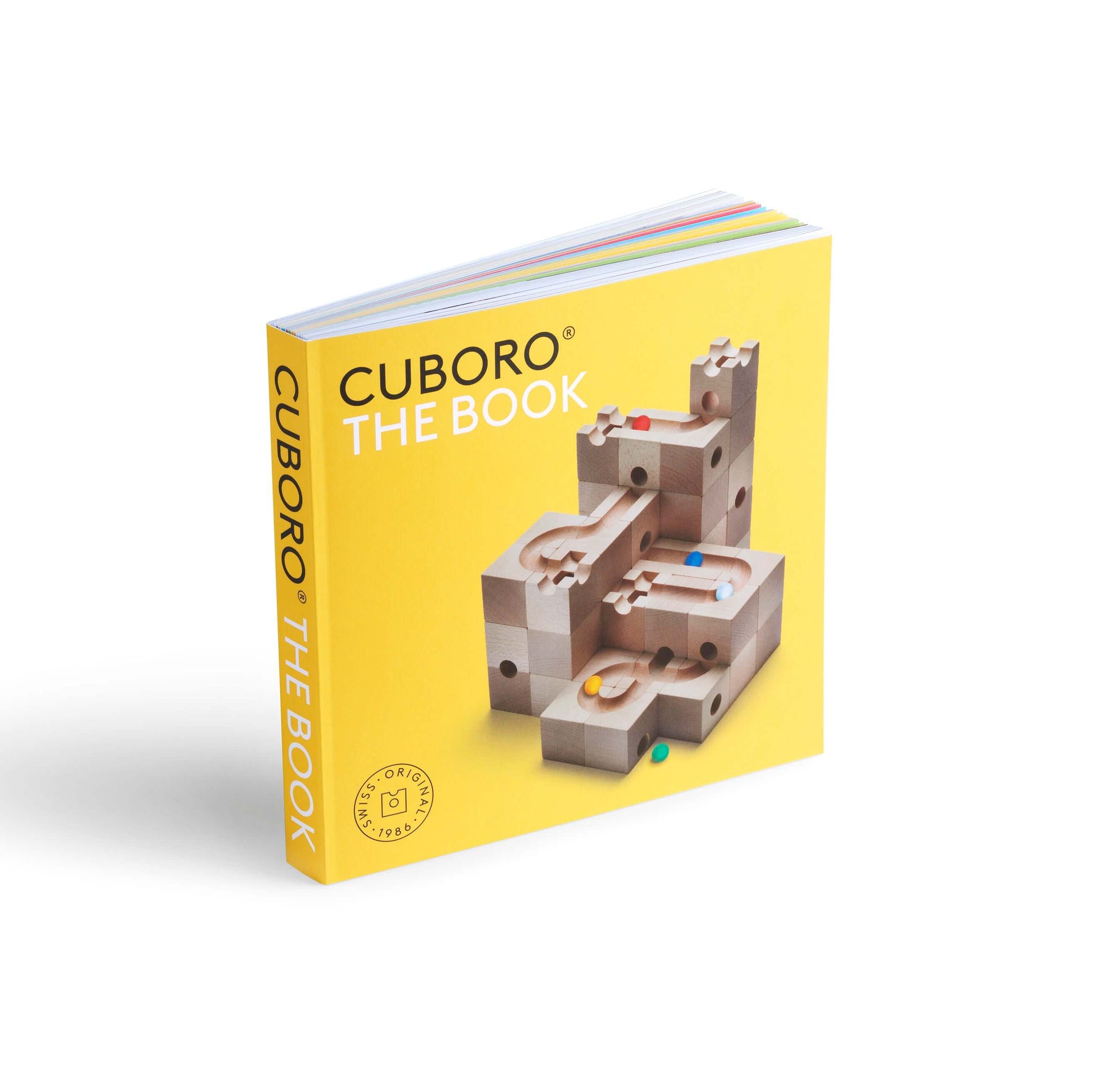 THE BOOK - Dive deeper into the mesmerizing world of CUBORO with "The Book" the ultimate guide to unlocking the full potential of your wooden educational toy system! This comprehensive book is your go-to resource for inspiration and detailed instructions,