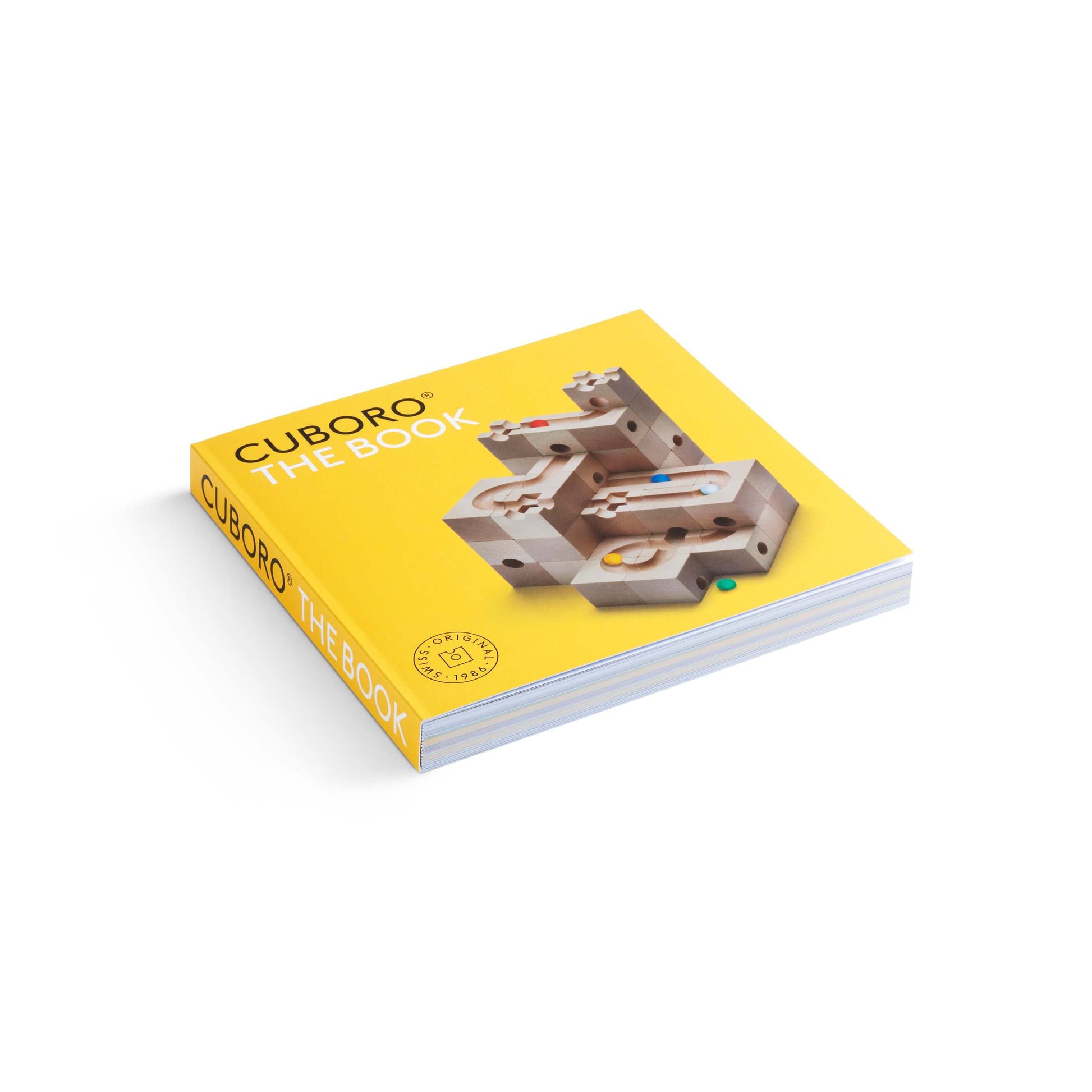 THE BOOK - Dive deeper into the mesmerizing world of CUBORO with "The Book" the ultimate guide to unlocking the full potential of your wooden educational toy system! This comprehensive book is your go-to resource for inspiration and detailed instructions,