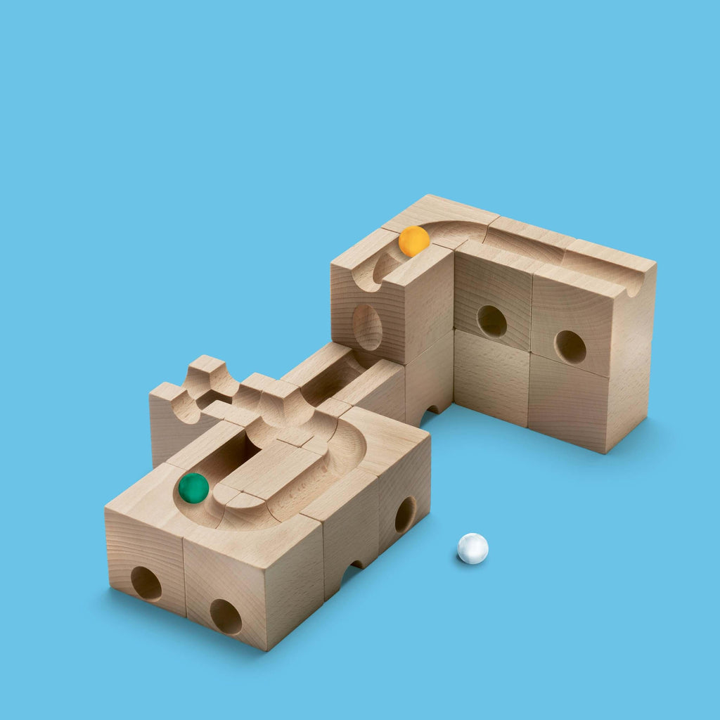 SPEED - Inject exhilarating velocity into your CUBORO marble runs with the SPEED Extra Set! This dynamic wooden educational toy includes 16 elements and 5 marbles, specifically designed to accelerate marbles, allowing them to cover longer distances with i