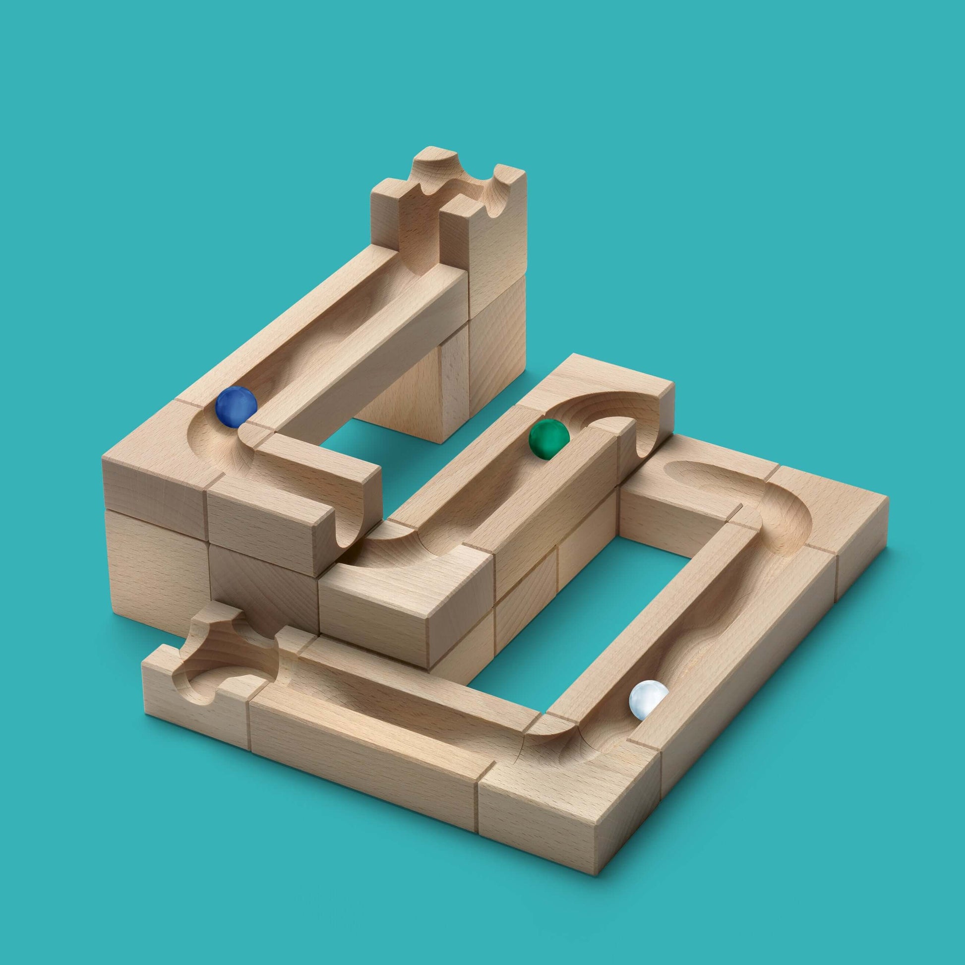 WAVE - Experience the elegant flow of motion with the CUBORO WAVE Extra Set, a captivating wooden educational toy designed to bring unique dynamics to your marble runs! This set includes 22 beautifully crafted elements and 15 marbles, allowing you to crea